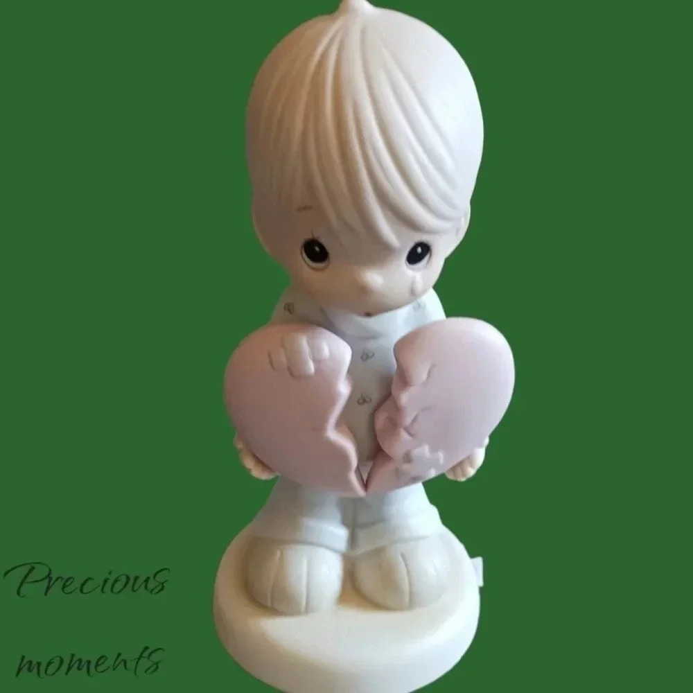 Precious moments figurine aboy holder broken heart